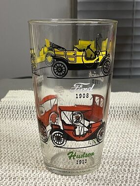 vintage Hazel-Atlas drinking glass featuring illustrations of antique cars